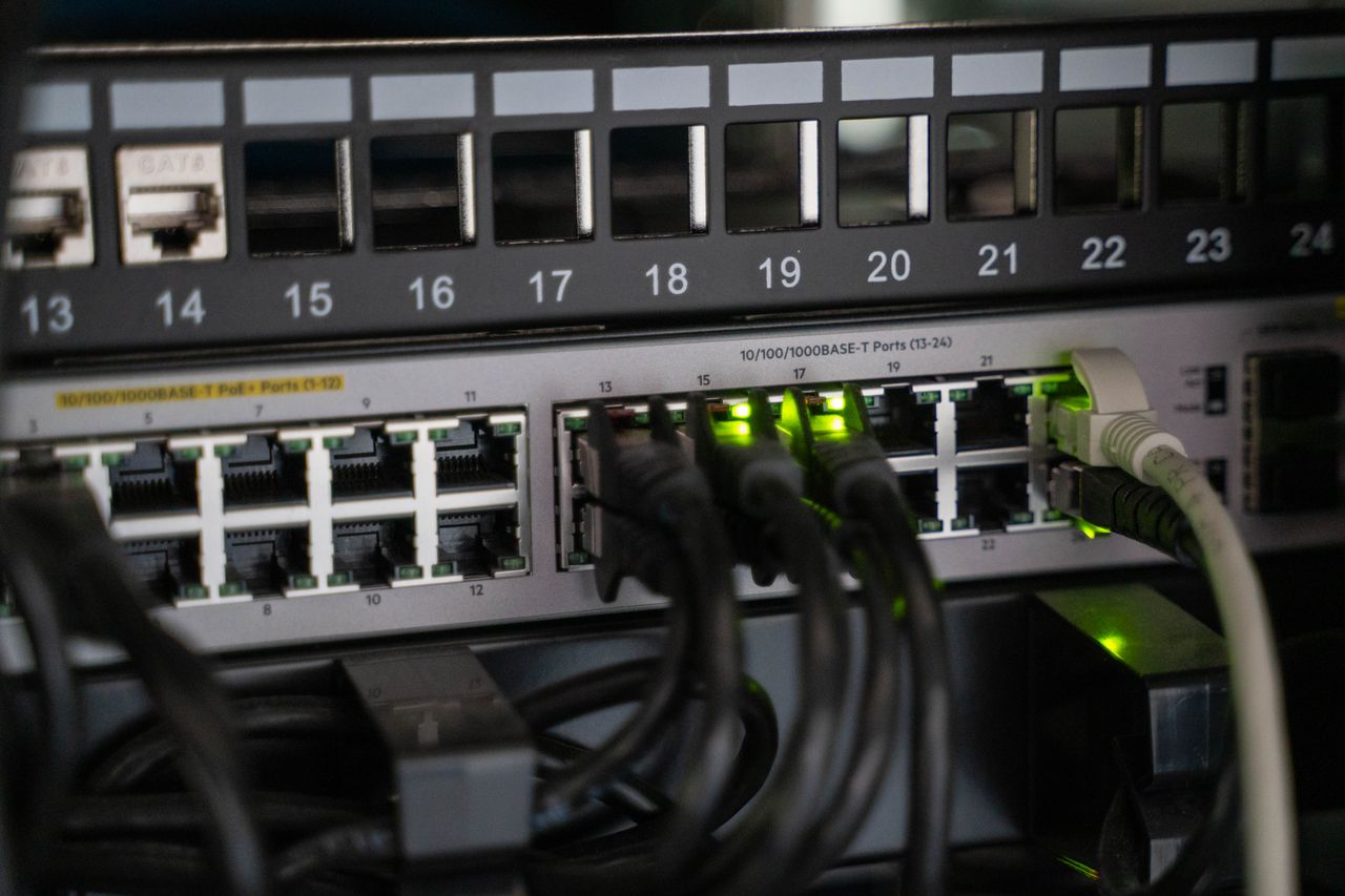 Crafting Captivating Headlines: Your awesome post title goes here Networking equipment with connected cables, showcasing modern technology infrastructure.